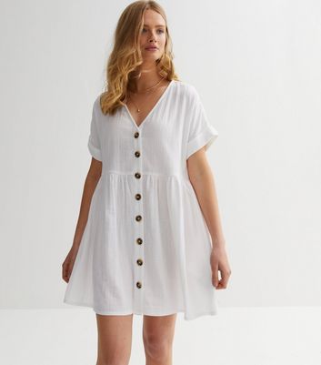 Asos design mini v neck 2024 button through smock dress in stripe