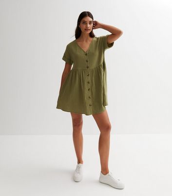 Smock dress with store buttons