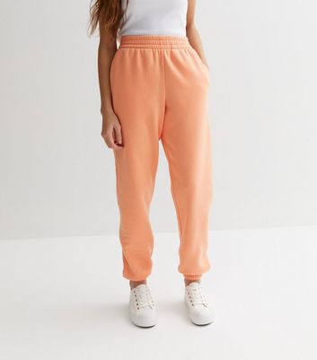 Missguided orange online joggers