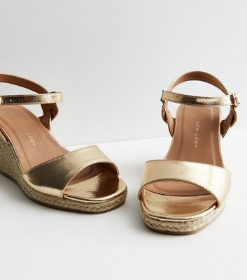 Gold leather shop wedge sandals