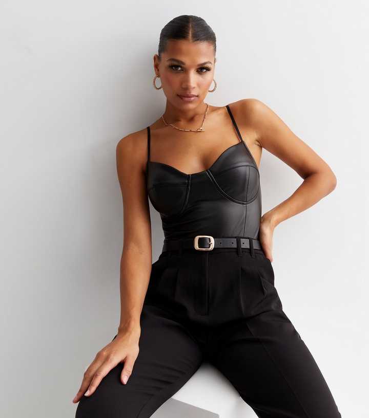https://media3.newlookassets.com/i/newlook/856928501/womens/clothing/tops/cameo-rose-black-leather-look-strappy-corset-bodysuit.jpg?strip=true&qlt=50&w=720
