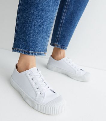 Wide white canvas store sneakers