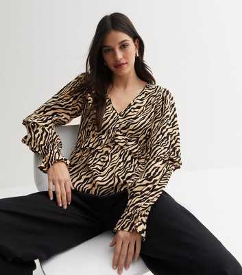 Off White Zebra Print Frill V Neck Peplum Top