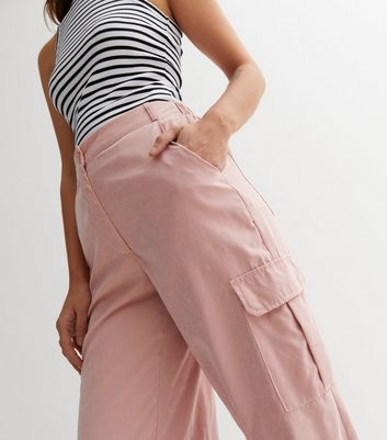 Petite Pink Paint Splatter Cargo Trouser | PrettyLittleThing