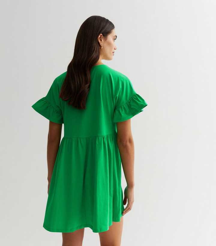 Green Jersey Tie Front Mini Smock Dress | New Look Green Jersey Tie Front Mini Smock Dress | New Look