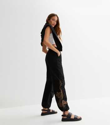 Black Dragon Embroidered Parachute Trousers