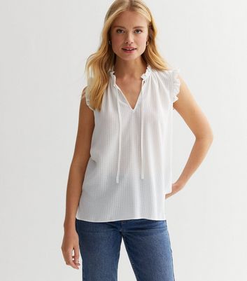 White sleeveless 2024 ruffle top