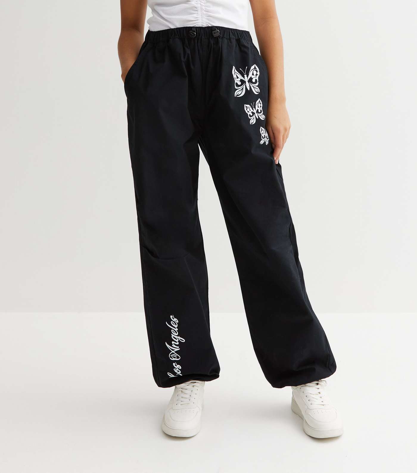 Girls Black Butterfly Los Angeles Logo Parachute Trousers Image 2