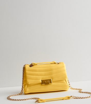 Mustard clutch bag online new look