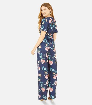 Navy store floral jumpsuits