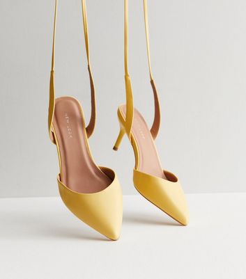 Mustard mid 2024 heel shoes