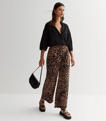 boohoo Leopard Print Jersey Flares  Printed pants outfits Leopard print  outfits Flared trousers outfit