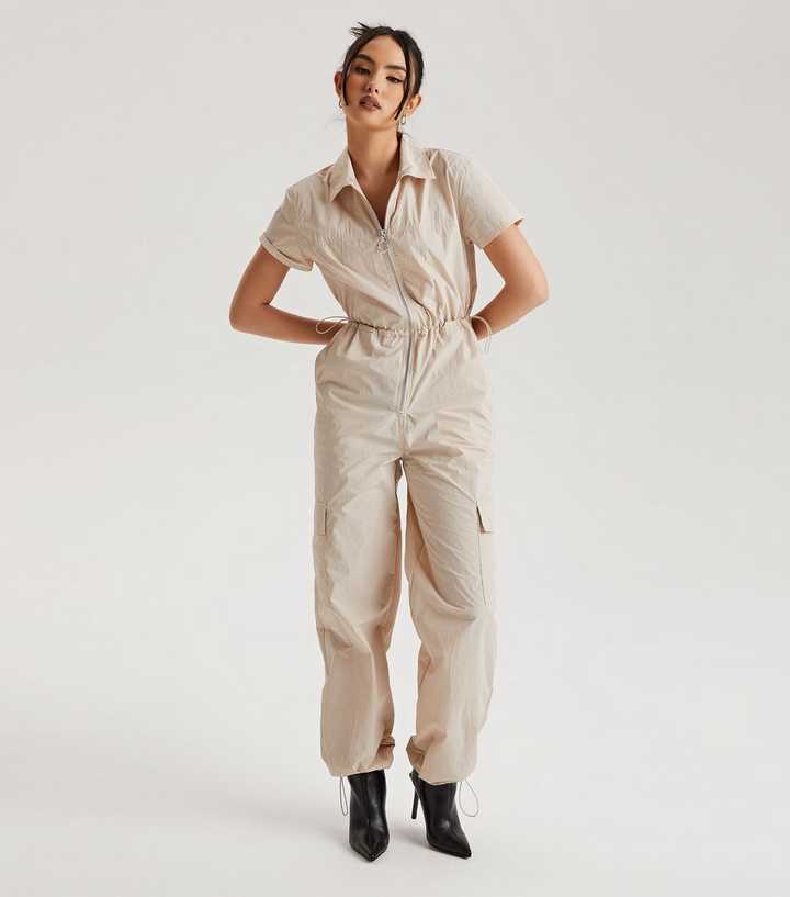 Jumpsuit With Zip Front And Utility Pockets Beige