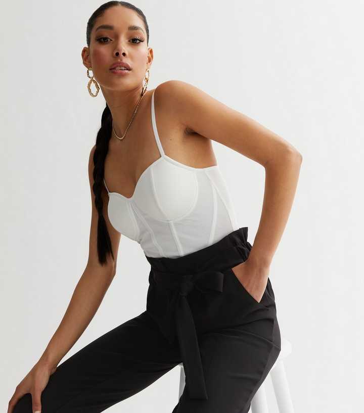 https://media3.newlookassets.com/i/newlook/863038610M1/womens/clothing/tops/white-mesh-strappy-bustier-bodysuit.jpg?strip=true&qlt=50&w=720