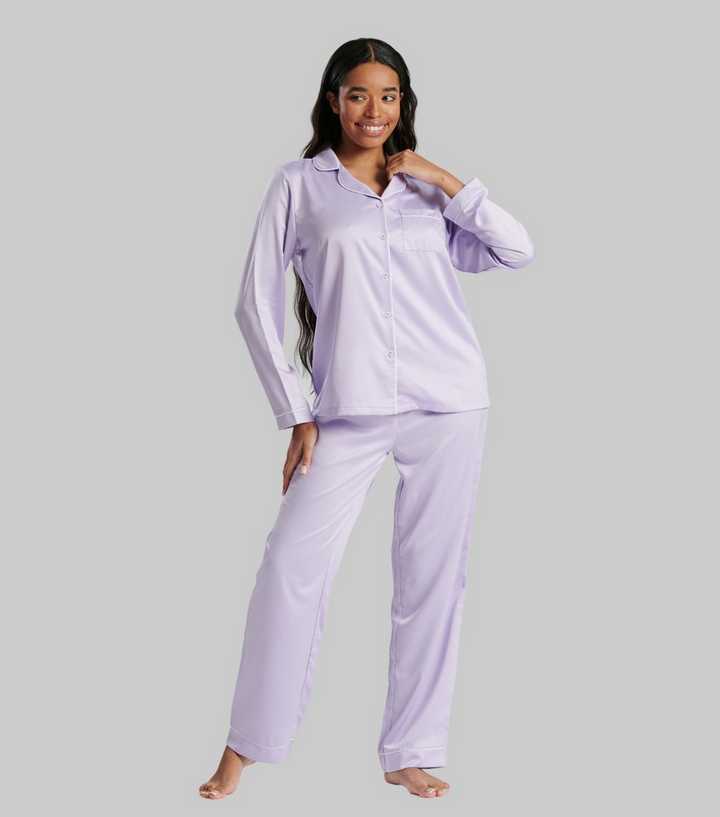 https://media3.newlookassets.com/i/newlook/863101855/womens/clothing/nightwear/loungeable-lilac-piping-satin-shirt-pyjama-set.jpg?strip=true&qlt=50&w=720