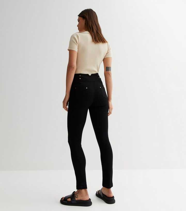 High Waisted Button Front Skinny Jeans