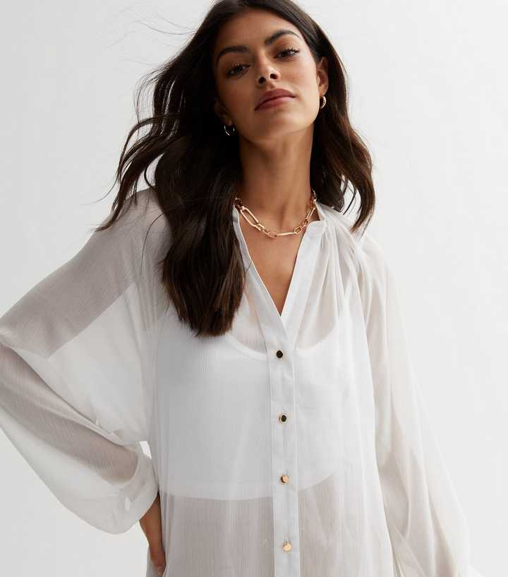 https://media3.newlookassets.com/i/newlook/863780910/womens/clothing/tops/white-long-sleeve-oversized-chiffon-shirt.jpg?strip=true&qlt=50&w=720