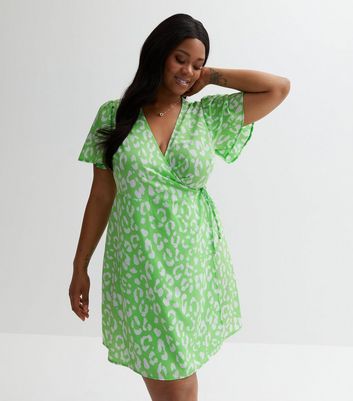 Green animal store print wrap dress