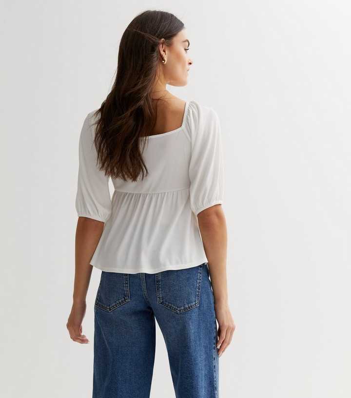 https://media3.newlookassets.com/i/newlook/866750310M3/womens/clothing/tops/white-rib-twist-front-top.jpg?strip=true&qlt=50&w=720