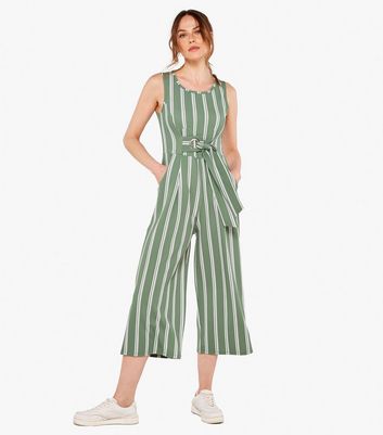 White and green store jumpsuit