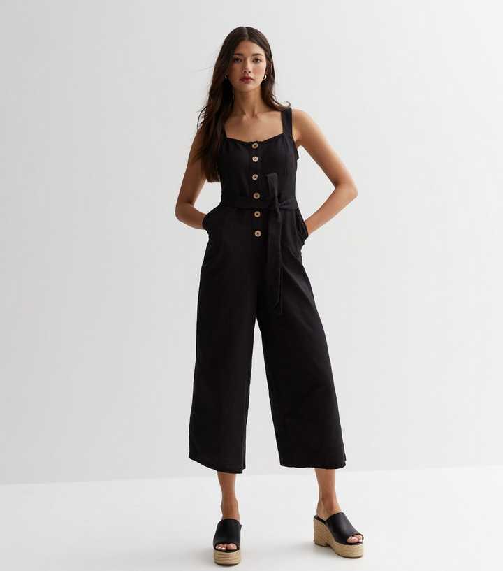 https://media3.newlookassets.com/i/newlook/867377401M2/womens/clothing/playsuits-jumpsuits/black-cotton-button-front-jumpsuit.jpg?strip=true&qlt=50&w=720