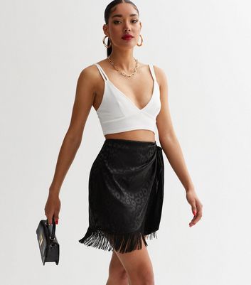 Leather-trimmed jacquard miniskirt