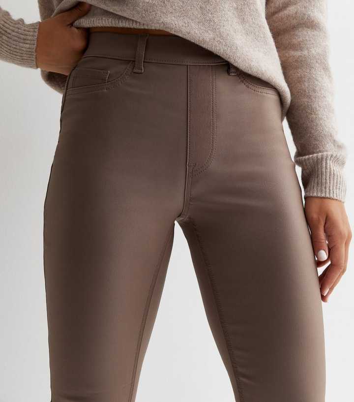 https://media3.newlookassets.com/i/newlook/868317623M1/womens/clothing/jeans/mink-coated-leather-look-mid-rise-lift-shape-emilee-jeggings.jpg?strip=true&qlt=50&w=720
