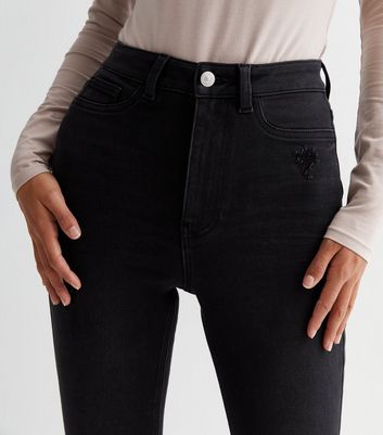 Black jeans store ripped knees womens