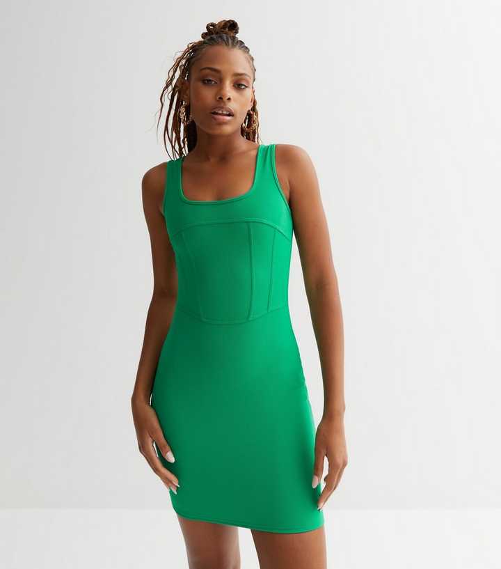 https://media3.newlookassets.com/i/newlook/868534237M2/womens/clothing/dresses/pink-vanilla-green-corset-bodycon-mini-dress.jpg?strip=true&qlt=50&w=720
