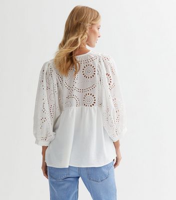 white broderie peplum top
