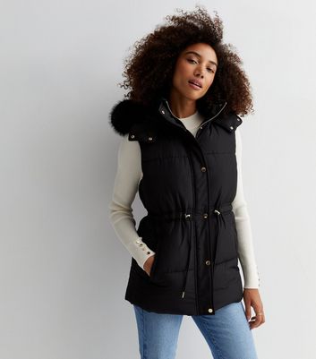 Black Faux Fur Hooded Drawstring Padded Gilet | New Look