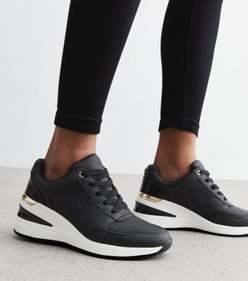 Black and best sale white wedge trainers