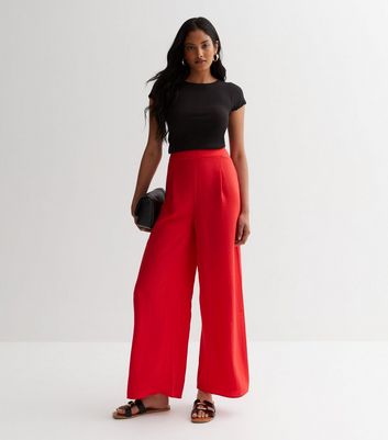 Lilly Belted Palazzo Trousers- Red from Sorelle Uk on 21 Buttons