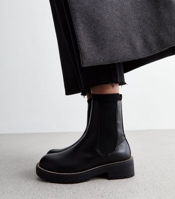 chelsea boots with gold trim