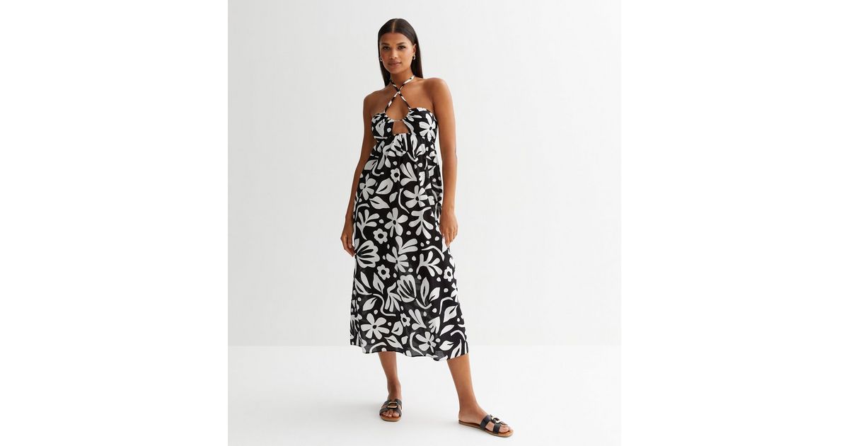 Halter neck dress with flower  in Black main image 1