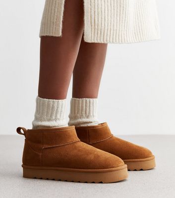 Fur lined 2025 tan boots