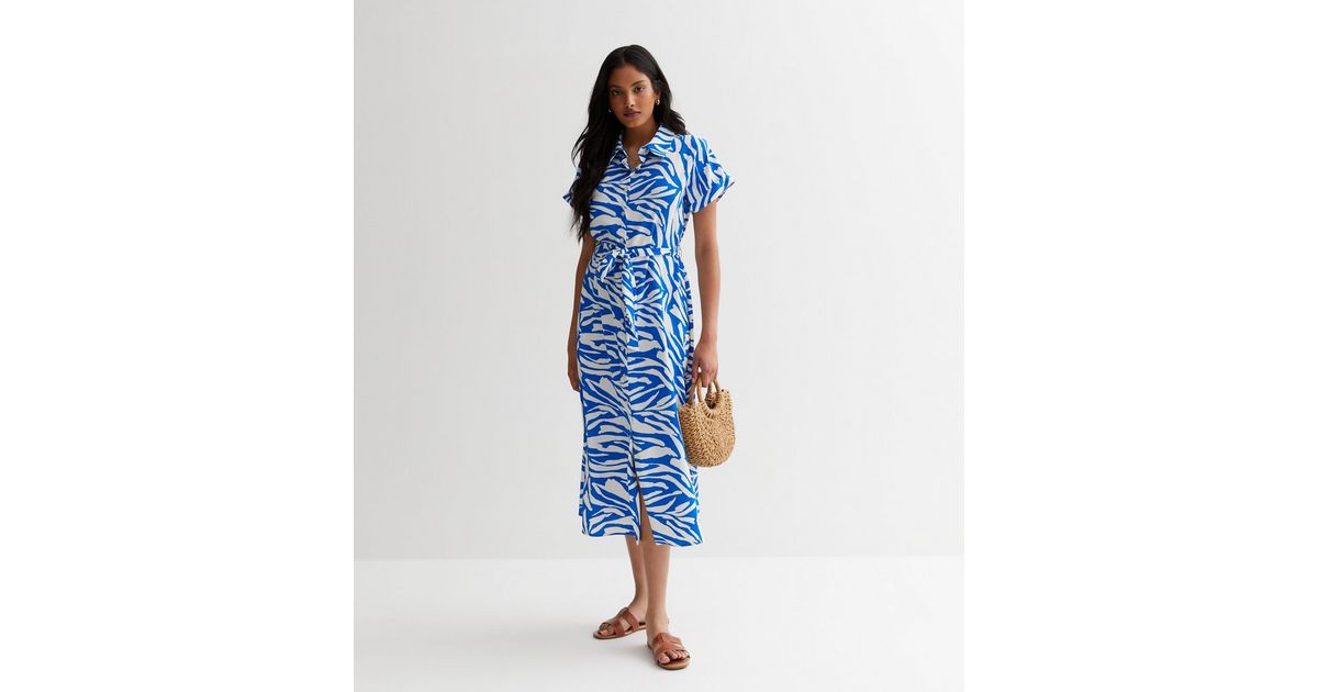 blue and white zebra print dress VTG 80s Saint Laurent Sheath Dress 38 Blue White Zebra Print Puff Sleeve Pencil