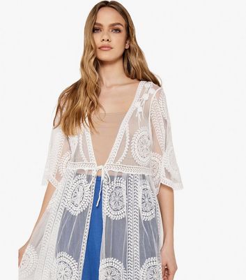 White embroidered cover clearance up