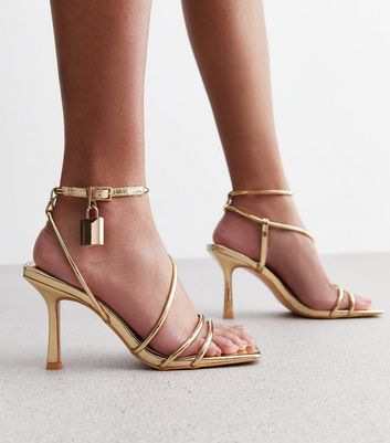 Gold strappy 2024 high heels