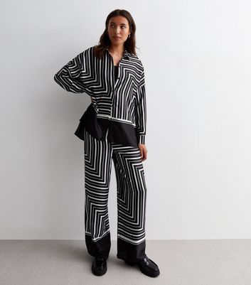 Womens striped pants black best sale and white