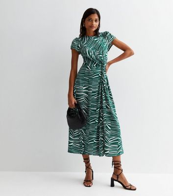 Dress with online knot in front