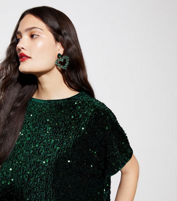 Green glitter clearance tops