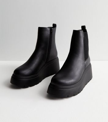 Leather boots hot sale wedge heel