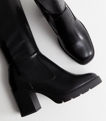 Wide fit heeled on sale knee high boots