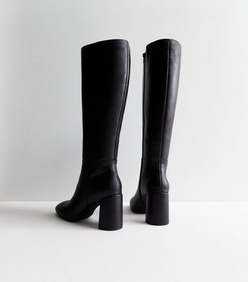 Low block heel knee high clearance boots