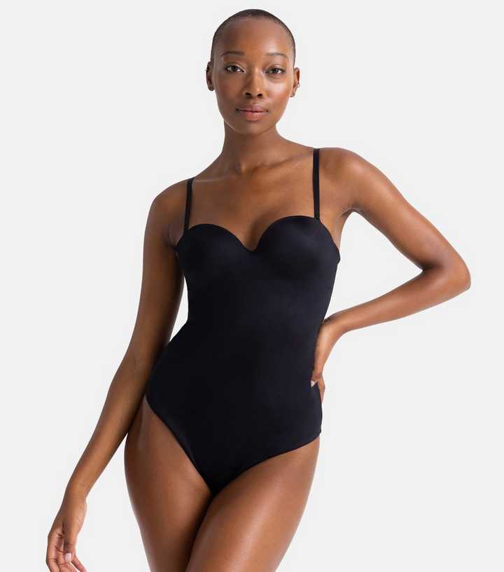 https://media3.newlookassets.com/i/newlook/876556801/womens/clothing/lingerie/dorina-black-strappy-shaping-bodysuit.jpg?strip=true&qlt=50&w=720