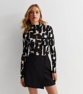 Black houndstooth print wrap mini clearance skirt