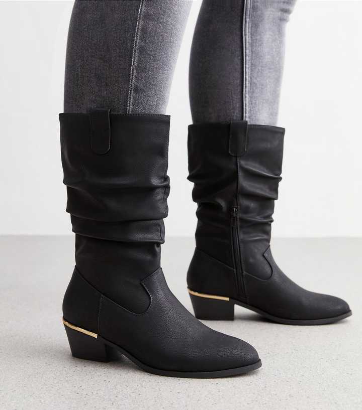 https://media3.newlookassets.com/i/newlook/877056101/womens/footwear/boots/black-leather-look-mid-calf-slouchy-boots.jpg?strip=true&qlt=50&w=720