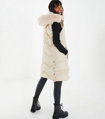 White gilet discount with fur hood