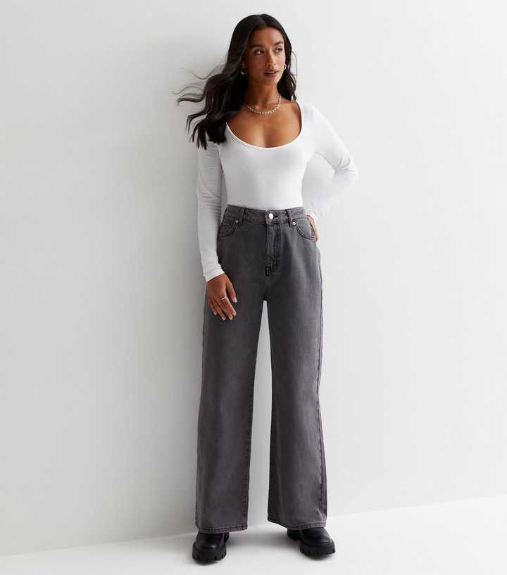 https://media3.newlookassets.com/i/newlook/878072703/womens/clothing/jeans/petite-dark-grey-high-waist-adalae-wide-leg-jeans.jpg?strip=true&qlt=50&w=720